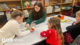 Sheffield A-level students helping younger children with reading