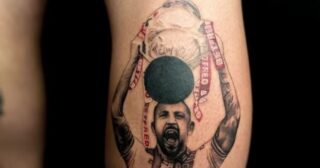 Tattoo artist commemorates The Robins’ treble win with intricate pieces
