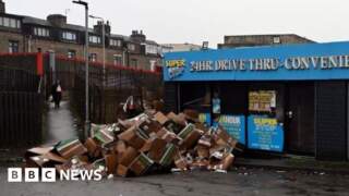 Electric vehicle charger boxes dumped in car park