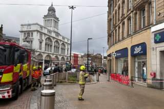 Firefighters called to Sheffield High Street after masonry falls off roof