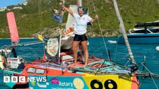 Record-breaking sailor completes solo global trip