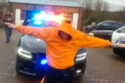 Moment 'adrenaline junkie' is set on fire before pulling two-tonne car across Wakefield storage yard