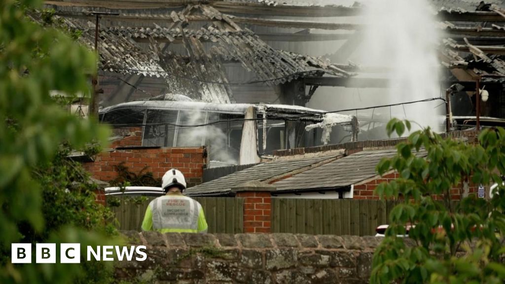 Three coaches lost after fire at travel company