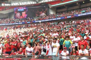 Hull KR fans' faces as they help to raise the rafters at Wembley in nail-biter of a Challenge Cup final