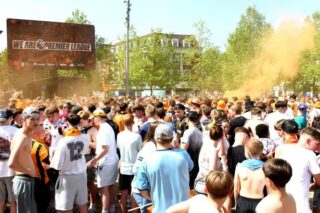 Golden day for a black-and-amber party as Hull City fans celebrate promotion – in pictures
