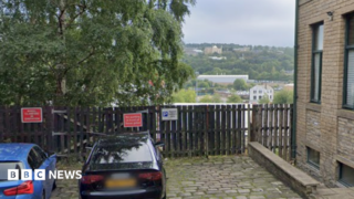 Man falls down Bradford railway embankment in police chase