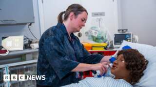 Dark-skin birthing manikin part of NHS training