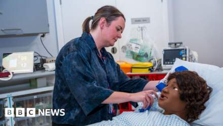 Dark-skin birthing manikin part of NHS training