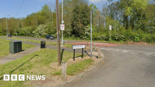 Woman in hospital and driver arrested after crash