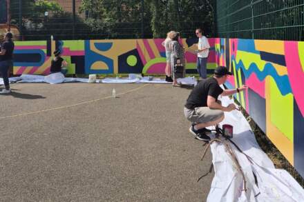 New mural provides colourful backdrop for Leeds community event
