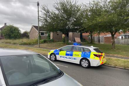 Residential street cordoned off after huge daylight blaze tears through bungalow